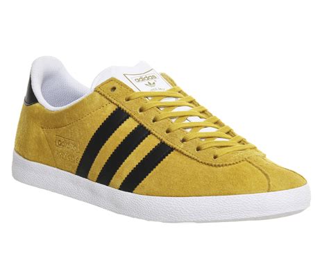 mustard yellow adidas shoes